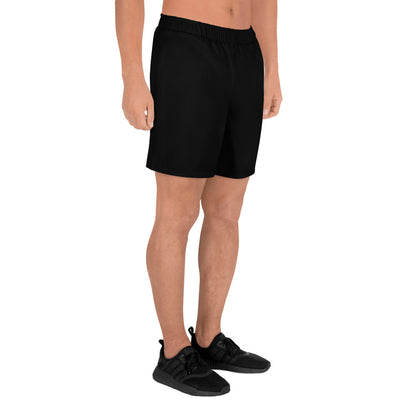 Purpose Unisex Sportshorts an männlichen Model in der Seitenansicht