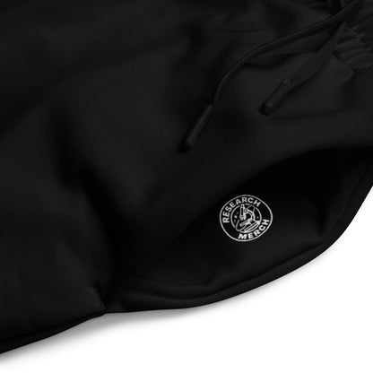 Research Merch Unisex Wide Leg Jogger aus der Purpose Collection in der Detailansicht mit Logo in der Hosentasche
